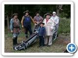 Members of Garden State Black Powder and young Andy pose with the cannon. 